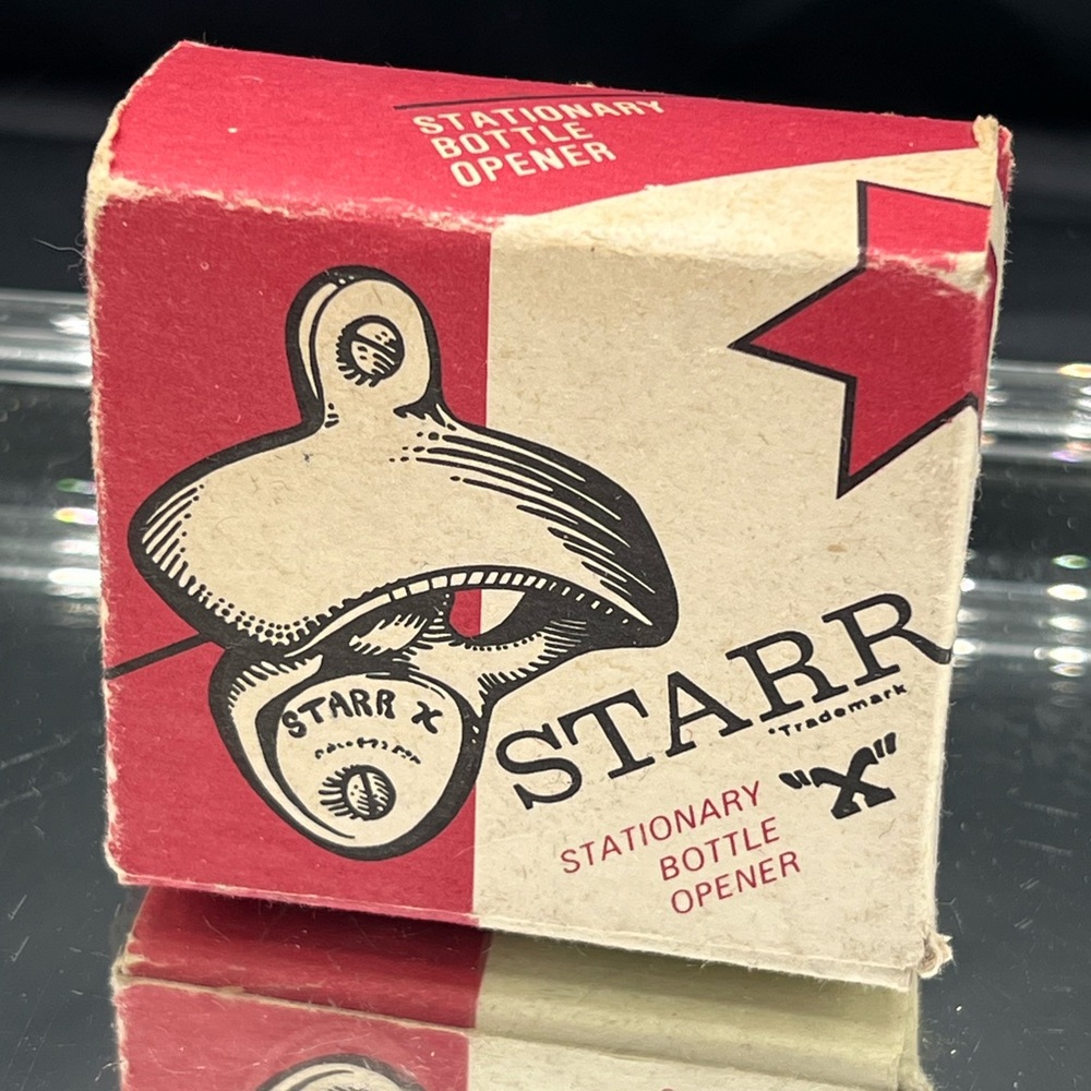 Red and Beige Stationary Bottle Opener